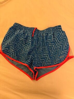 Women's Nike Size M Blue Chevron Running Shorts with Pink Trim